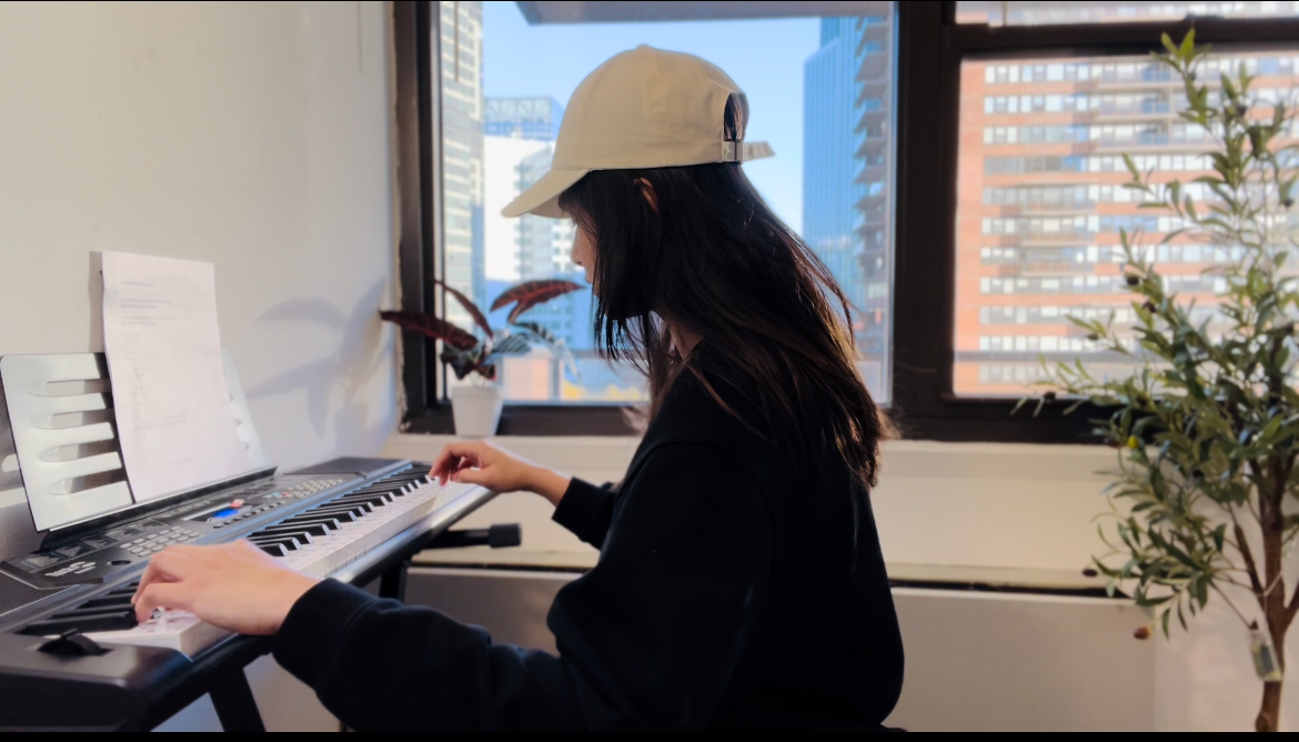 Maneesha Venigalla playing piano